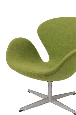 Lot 2228 - Arne Jacobsen (1902-1971) for Fritz Hansen: A Swan Chair, model No.3320, green wool upholstered...