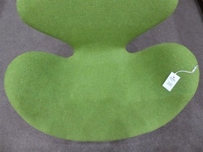 Lot 2228 - Arne Jacobsen (1902-1971) for Fritz Hansen: A Swan Chair, model No.3320, green wool upholstered...