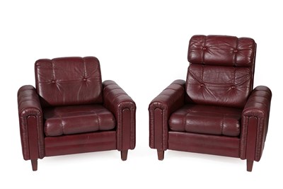 Lot 2240 - A Pair of 1970's Danish High and Low Back Easy Chairs, upholstered in wine leather, 89cm wide, 73cm