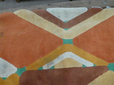 Lot 2248 - A 1970's  Modernist Abstract Octagonal Rug, in oranges, green, brown and cream, unmarked, 263cm...