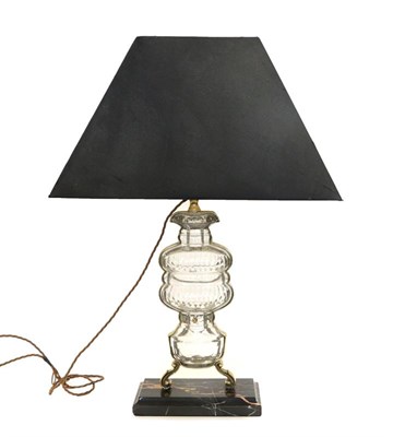 Lot 2262 - A French Maison Bagues (Attributed) Bronze and Crystal Table Lamp, unmarked, on a black marble...