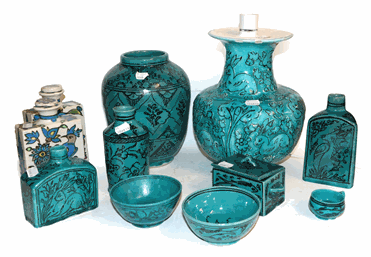 Lot 272 - A Persian turquoise ground tea canister together with eleven other similar items (12)