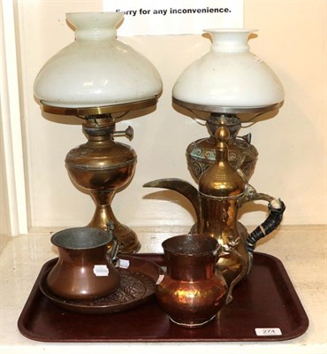 Lot 274 - Two copper lamps, a Persian coffee pot, and two other items (5)