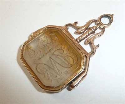 Lot 353 - A Gold and Carnelian Swivel Fob, circa 1825, the octagonal seal engraved on one side with an...