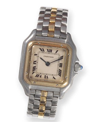 Lot 380 - A Lady's Steel and Gold Wristwatch, signed Cartier, model: Panther, circa 1984, quartz...