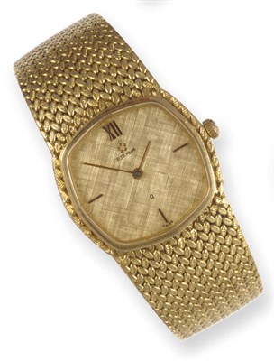 Lot 382 - A Lady's 18ct Gold Wristwatch, signed Eterna, circa 1980, quartz movement, gilt textured dial, case