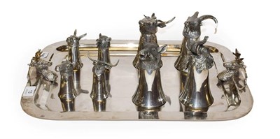 Lot 13 - Eight silver plated zoomorphic stirrup cups on tray by Kenneth Turner