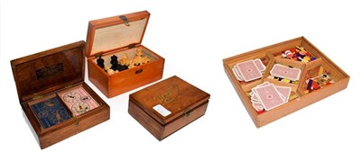 Lot 31 - A mid 20th century games compendium, chess set in box, together with two bezique cabinets, one with