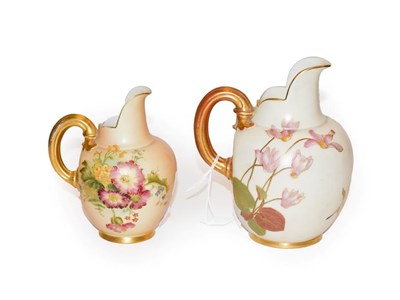 Lot 38 - Two Royal Worcester blush ivory jugs, both painted with flowers, both model 1094, tallest 17cm high