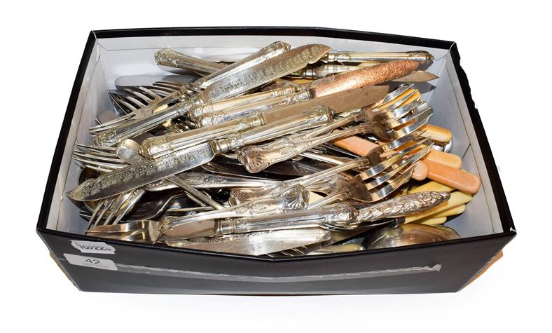Lot 42 - A box of silver plated cutlery and a small quantity of silver including a provincial teaspoon,...