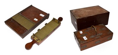 Lot 46 - A walnut cigar humidor maker Astleys, an oak cigarette and cigar box with labelled covers...