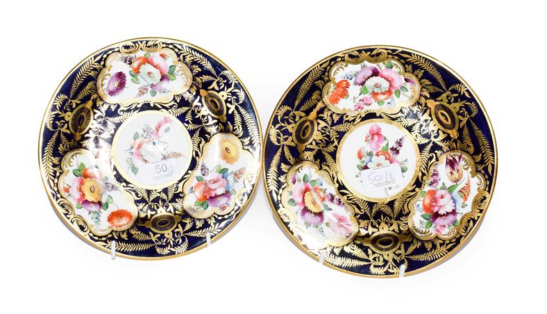 Lot 50 - A pair of early 19th century English porcelain plates, Coalport style, decorated with floral...