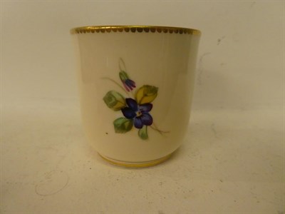 Lot 78 - A Royal Worcester cup and saucer with butterfly moulded handle and painted with flowers, green...