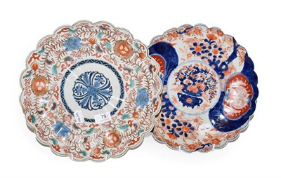 Lot 79 - Two Japanese Meiji period fluted Imari chargers, one decorated in red, green and blue enamels...