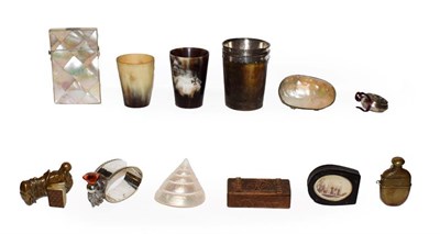 Lot 82 - A tray of collectables including Scottish horn beakers, babies rattle, mother of pearl card...