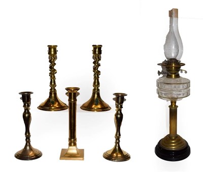 Lot 92 - A 19th century brass columnar oil lamp and five various 19th century brass candlesticks