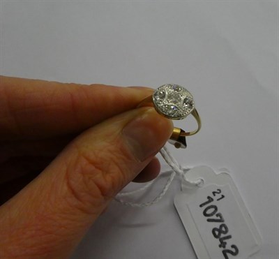 Lot 107 - An Art Deco diamond cluster ring, the five old cut diamonds in white claw settings, to a...
