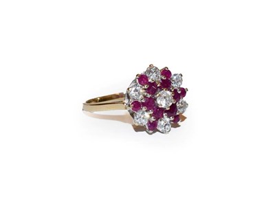 Lot 119 - A 9 carat gold synthetic ruby and white stone cluster ring, finger size Q