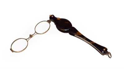 Lot 123 - A pair of Victorian tortoiseshell cased lorgnette with spring action, inlaid with a plain...