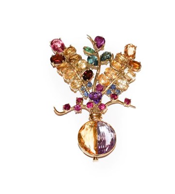 Lot 124 - A multi-gemstone brooch, by Mingardo, of giardinetto design, the vase formed of half amethyst...
