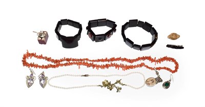Lot 136 - Mixed jewellery including a coral necklace, a jet and cornelian bangle, a jet and gilt metal...
