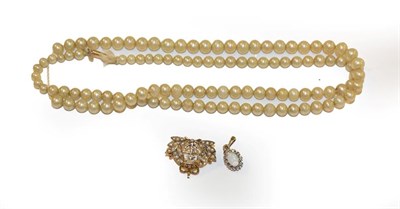 Lot 136A - A cultured pearl necklace, clasp stamped '9CT', length 59cm; a 9 carat gold split pearl crown...