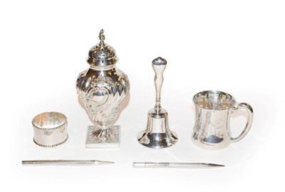Lot 150 - A collection of silver, comprising a caster, a Christening-mug; a napkin-ring, a table-bell...
