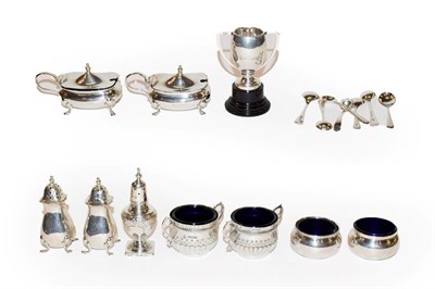 Lot 155 - A collection of silver condiment items, including two pairs of salt-cellars, a four-piece...