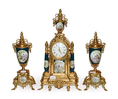 Lot 200 - A reproduction French style gilt metal three-part clock garniture, with Quartz movement, 44cm high