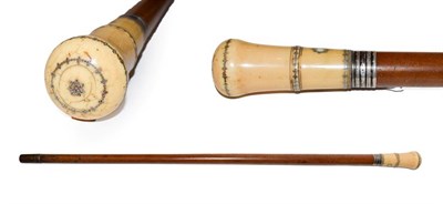 Lot 204 - A ivory and pique mounted malacca walking cane, 18th century, with a white metal ferrule, 90cm