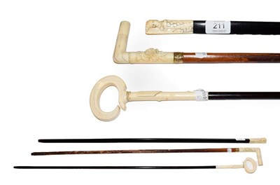 Lot 211 - An ivory mounted malacca walking cane, probably Dieppe circa 1900, with yellow metal ferrule,...