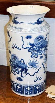 Lot 245 - A large Chinese blue and white cylindrical vase, painted in underglaze blue with dogs of fo, 51cm