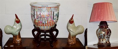 Lot 256 - A pair of modern Chinese models of cockerels, a table lamp, a decorative fishbowl (3)