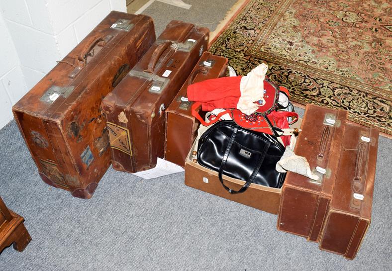 Lot 257 - Five graduated tan leather suitcases and a quantity of vintage ladies handbags