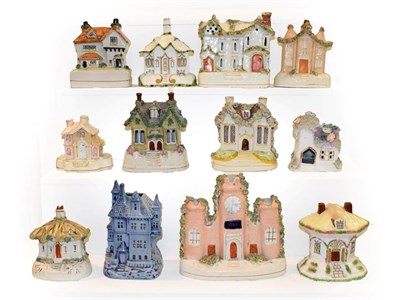 Lot 268 - A collection of pastille burners, including 19th century Staffordshire examples and Coalport...