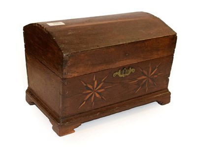 Lot 280 - An 18th century oak dome top table box, the hinged lid enclosing a later candle box above two...