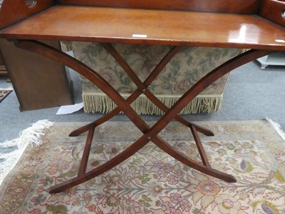 Lot 1068 - A butlers tray table on folding stand