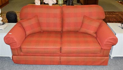 Lot 1071 - A wool upholstered two-seater sofa bed in subtle red check design, 177cm by 97cm by 90cm highÂ