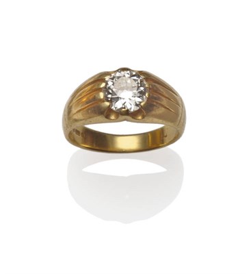 Lot 435 - An 18 Carat Gold Diamond Solitaire Ring, the old cut diamond within a yellow claw setting to...