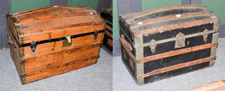 Lot 1087 - Two 19th century wood and metal bound dome-top steamer trunks, largest 84cm by 48cm by 60cm...