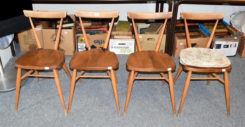 Lot 1095 - A set of four Ercol elm and beech stacking chairs, stamped, seat height 44cm