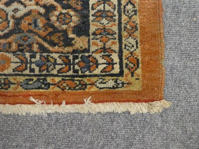 Lot 1096 - A Sultanabad carpet, West Iran, circa 1920, the soft terracotta field with an allover design of...