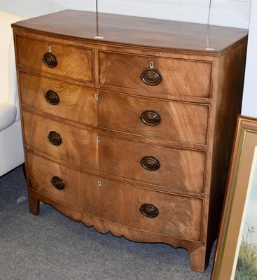 Lot 1116 - A George IV mahogany bow-front chest of drawers with reeded moulding a bracket feet, 102cm by...