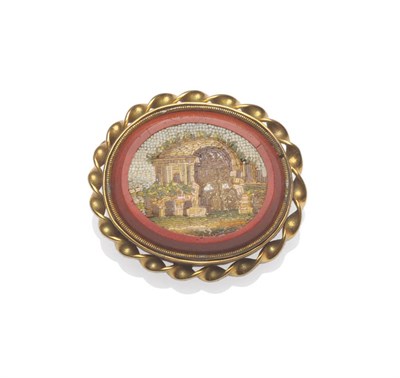 Lot 440 - A Micro Mosaic Brooch, depicting a classical scene, set in Jasper in an oval twist frame,...