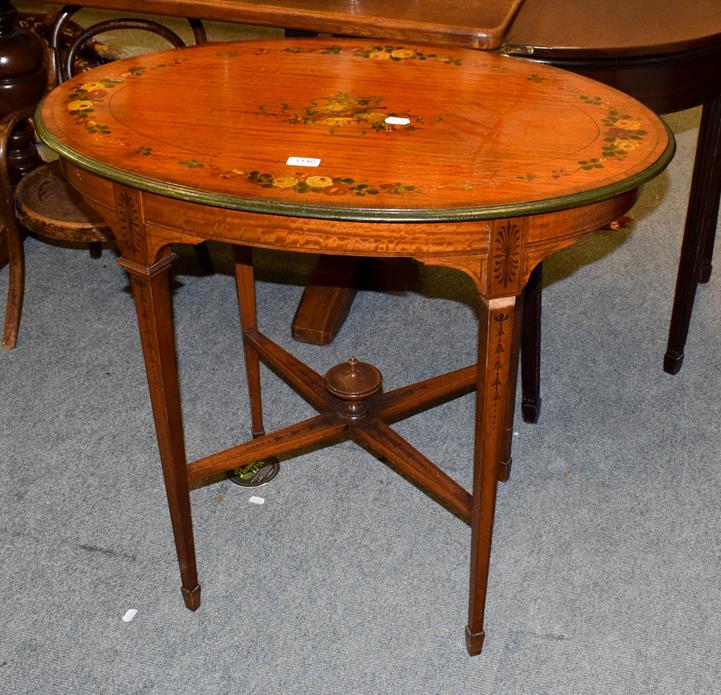 Lot 1140 - An Edwardian painted satinwood oval occasional table, crossbanded in rosewood, raised on square...