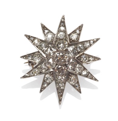 Lot 441 - A Victorian Diamond Star Brooch, twelve alternating long and short arms set throughout with old cut