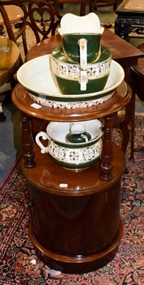 Lot 1150 - A 19th century mahogany circular washstand, 46cm diameter by 82cm together with wash jug, bowl,...