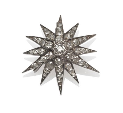 Lot 442 - A Victorian Diamond Star Brooch, twelve alternating long and short arms set throughout with old cut