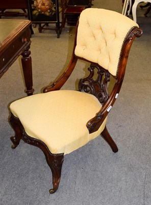 Lot 1168 - A Victorian carved mahogany upholstered nursing chair