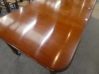 Lot 1172 - A Victorian mahogany extending dining table with additional leaf, 106cm by 180cm by 76cm high...